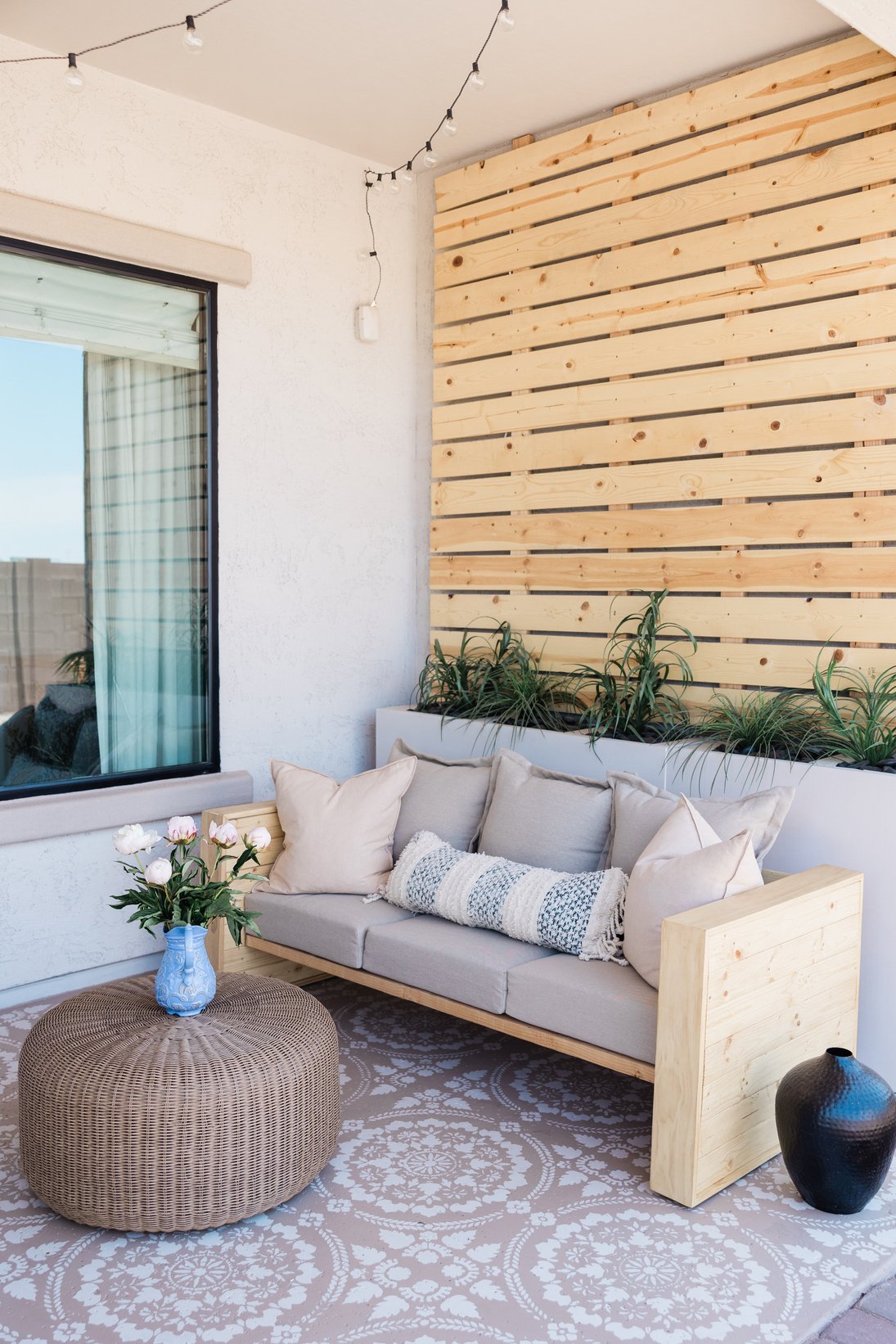 Sofa and Plants Outside the House